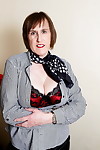 British nan licks a nipples as she strips to satin lingerie and mesh stockings