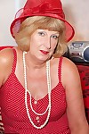 Mature amateur DirtyDoctor pulls her bare tits out of her red dress