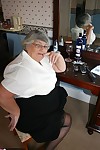 Fat grandmother with short grey hair has phone sex in black stockings only