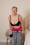 Grey haired gran from the UK strips to her silk underwear and nylons