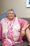 Horny Grandma Libby strips and spreads her old shaved pussy on the sofa