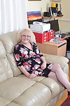 Old British lady in lingerie and tan nylons pleases herself with a vibrator