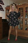 Fat grandmother with blonde hair exposes herself in tan nylons and garters