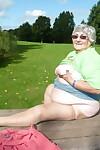 Obese oma Grandma Libby exposes her large tits and butt on a picnic table
