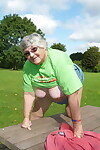Obese oma Grandma Libby exposes her large tits and butt on a picnic table