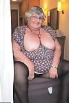 Fat UK nan Grandma Libby bares her tits on a balcony before getting butt naked
