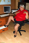 Obese British nan Grandma Libby gets totally naked on a computer desk