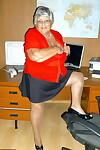 Obese British nan Grandma Libby gets totally naked on a computer desk