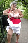 Obese amateur Grandma Libby exposes her boobs on a public walking trail