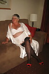 Old amateur Girdle Goddess uncovers her floppy tits and huge belly