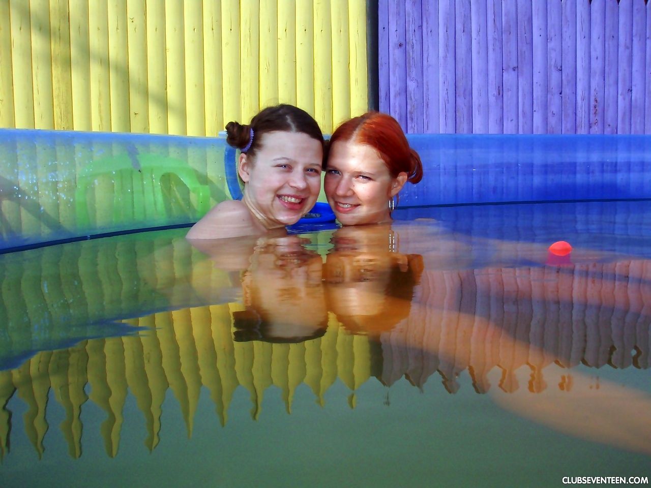 Barely legal girls Britt E and Anita E play with their pussies underwater