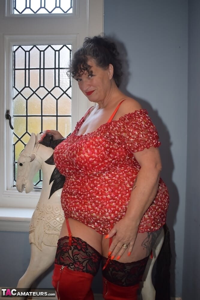 Fat granny shows her huge boobs and big ass in over the knee boots