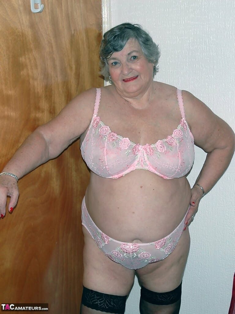 Obese old woman Grandma Libby masturbates on her bed in stockings