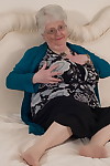 Overweight British grandmother covers her naked boobs with her hands