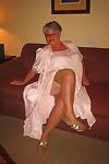 Amateur granny on the heavy side shows her pussy in lingerie and tan nylons